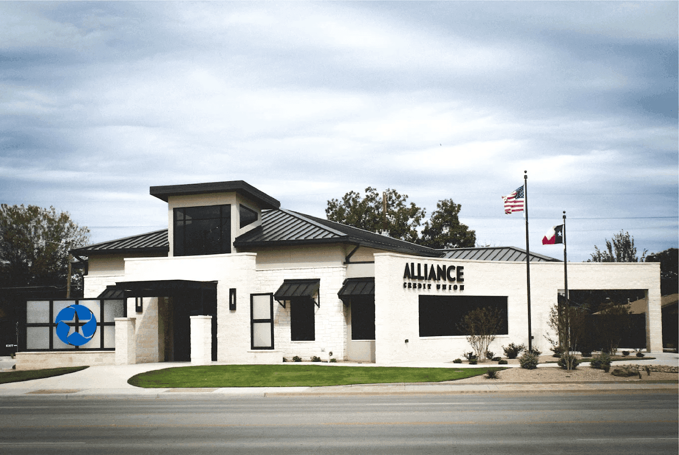 alliance credit union building with stone masonry facade and tower element